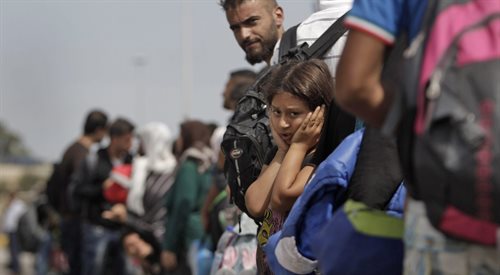 Syryjscy uchodźcy w porcie w Pireusie, 9 września 2015 roku