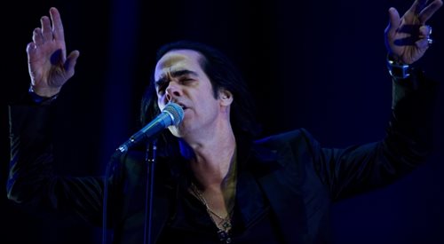 Australijczyk Nick Cave z grupą the Bad Seeds na scenie w drugim dniu Opener Festival w Gdyni