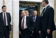 Władimir Putin w czasie przerwy w mińskich obradach