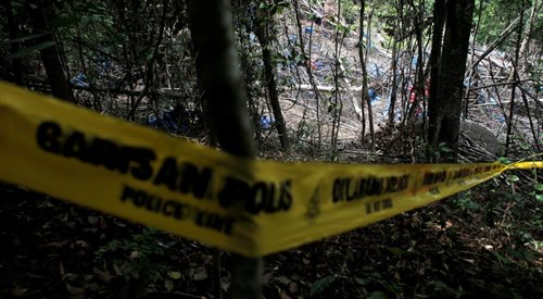Malezyjska policja odkryła masowe groby w pobliżu obozu przemytników ludzi na północnym zachodzie kraju, przy granicy z Tajlandią