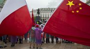 Chińczycy mieszkający w Polsce witają prezydenta Chin.