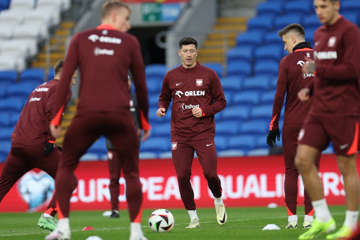 Poland players, led by captain Robert Lewandowski (centre), during a training session in Cardiff on Monday.
