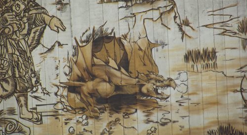Smok wawelski na muralu w Krakowie