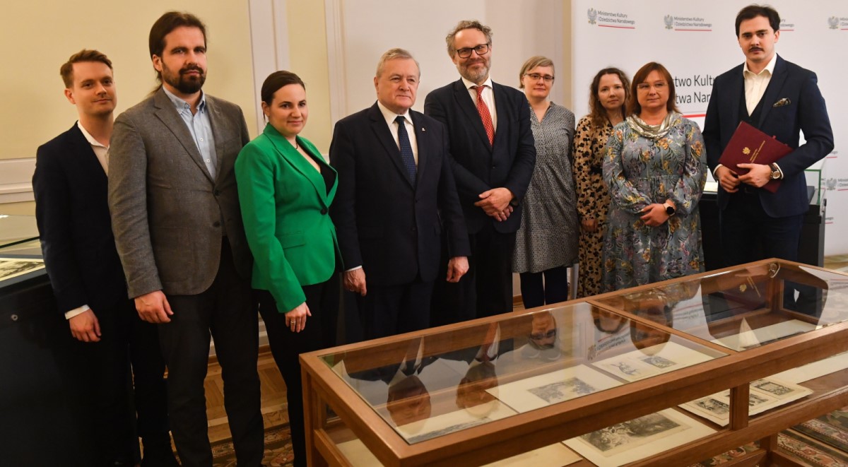 Polands Deputy Prime Minister and Culture Minister Piotr Gliński (centre) unveils a set of 26 engravings stolen by Nazi Germany during World War II, and regained this week by the Polish government; in Warsaw, on Friday, March 24, 2023.