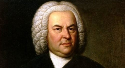 Johann Sebastian Bach (portret Eliasa Gottloba Haussmanna). Wydawałoby się, że mistrza późnego baroku niewiele łączy z polskim modernistą. A jednak...