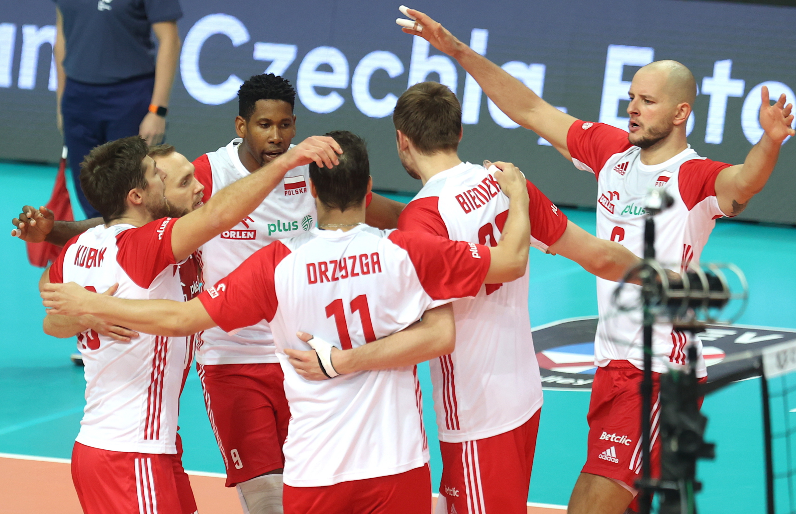 Poland players celebrate after defeating Serbia and winning the bronze at the 2021 Mens European Volleyball Championship in Katowice, southern Poland, on Sunday, September 19, 2021.