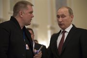 Putin rozmawia z dziennikarzem po spotkaniu mińskim