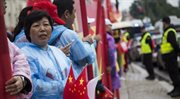 Chińczycy mieszkający w Polsce witają prezydenta Chin.