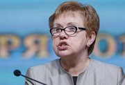 Lidzija Jarmoszyna, przewodnicząca Centralnej Komisji Wyborczej ogłasza wyniki: ponad 83 procent dla Aleksandra Łukaszenki, rządzącego Białorusią od 1994 roku
