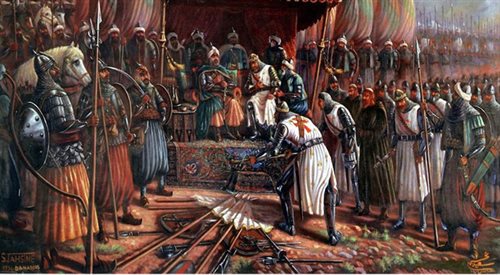 Król Jerozolimy Guy de Lusignan składa broń przed Saladynem po przegranej bitwie pod Hittin w 1187 r.