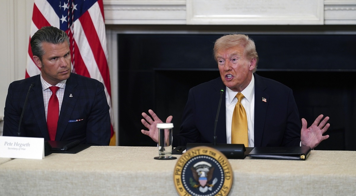 US President Donald Trump (R) and US Secretary of Defense Pete Hegseth (L) during a roundtable with the Homeland Security Task Force in the State Dining Room of the White House in Washington, DC, USA, 23 October 2025.
