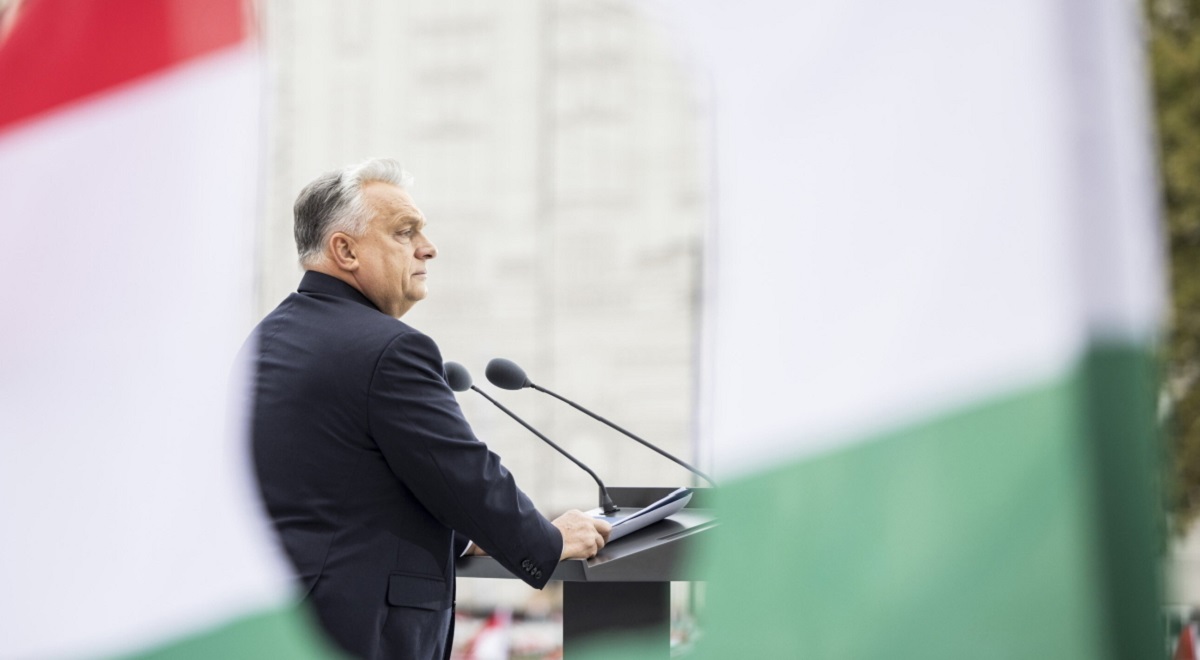 A handout photo issued by the Hungarian Prime Ministers General Department of Communication shows Hungarian Prime Minister Viktor Orban delivering a speech during a ceremony marking the 69th anniversary of the 1956 Hungarian revolution and war of independence against communist rule and the Soviet Union, in front of the Parliament building at Kossu